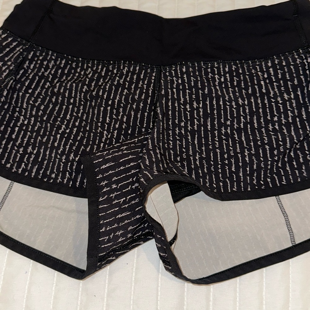 Lululemon Black shorts w writing